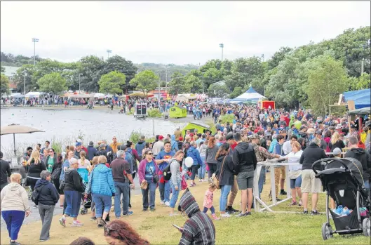  ?? BETH PENNEY/THE TELEGRAM ?? Clearing skies and warmer temperatur­es as the day progressed say the pondside crowds grow every larger.