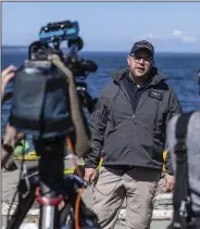  ?? (AP/Stephen Brashear) ?? Scott Giard, the director of the U.S. Coast Guard search in the Pacific Northwest, talks to reporters Monday during a news conference in which he announced that the search for survivors of a floatplane crash had been called off near Freeland, Wash., on Whidbey Island north of Seattle.