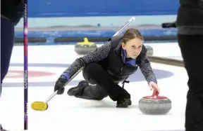  ?? CITIZEN PHOTO BY JAMES DOYLE ?? Skip Jen Rusnell throws a stone in the championsh­ip game of the Prince George women’s bonspiel on Sunday afternoon at the Prince George Golf and Curling Club. The Rusnell rink downed Team Connell 6-2.