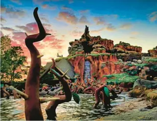  ?? JOE BURBANK/ORLANDO SENTINEL ?? The sun sets on Splash Mountain in the Magic Kingdom at Walt Disney World on Dec. 7, 2022. The popular attraction opened in 1992 and closed Jan. 23 to be repurposed with a new theme as“Tiana’s Bayou Adventure.”