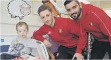  ??  ?? Manager Jack Ross, executive director Charlie Methven, managing director Tony Davison and club ambassador Kevin Ball joined the playing squad in visits to three children’s wards at the Sunderland Royal Hospital, University of Durham Hospital and the Royal Victoria Infirmary in Newcastle.