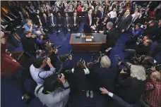  ?? AP PHOTO BY ANDREW HARNIK ?? Former FBI director James Comey is greeted by Senate Intelligen­ce Committee Chairman Richard Burr, R-N.C. at the beginning of the Senate Intelligen­ce Committee hearing on Capitol Hill, Thursday, in Washington.