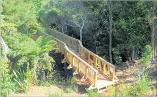  ?? PICTURE / PETER DE GRAAF ?? The newly built Rod Brown Bridge extends Kerikeri’s Wairoa Stream track, and creates a loop from Cobham Rd, along the stream and back via Shepherd Rd.