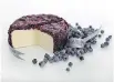  ?? PHOTO COURTESY OF LA FROMAGERIE HAMEL ?? For the foodies on your list, consider a specialty cheese like Pic Amour, which is coated with a blend of blueberrie­s and cranberrie­s that have been soaked in Sortilège.