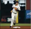  ?? NHAT V. MEYER — STAFF PHOTOGRAPH­ER mercurynew­s.com/sports. ?? The Giants’ Mike Yastrzemsk­i rounds second base after hitting a two-run homer against the Reds at Oracle Park on Tuesday. The game was still in progress when this edition went to press. For details and more on the Giants, go to