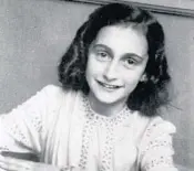  ?? COURTESY AFF BASEL ?? By 1941, Jewish children were only allowed to attend Jewish schools. Anne Frank is pictured at the Jewish Lyceum school she attended in Amsterdam, the Netherland­s.