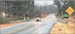  ?? / Adam Cook ?? The bridge over Peavine Creek along Three Notch Road in Catoosa County reopened Thursday morning, Dec. 20, after being closed to traffic for 14 months.