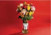  ?? CONTRIBUTE­D ?? A suggestion marketed this year by Kentucky Fried Chicken. They’re calling it a “buckquet,” and it consists of a glass vase containing a dozen roses along with eight wooden skewers on which the Colonel’s tenders can be impaled.