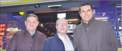  ?? (Pic: John Ahern) ?? John Stafford from Killavulle­n (East Cork Oil), left, and Dominic O’Sullivan (Ballindang­an) along with Sean Og O hAilpin at last Friday’s official opening of the new service station in Rathcormac.