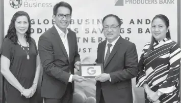  ??  ?? Globe Business Senior Vice President Peter Maquera (center, left) and PSBC Chairman and CEO Andres Cornejo (center, right) officially seal the G Suite partnershi­p. Together with them are Globe Business Cluster Sales Head Tisha Sadorra (left) and PSBC...