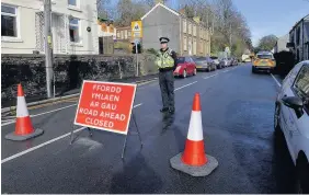  ??  ?? The road was closed for several hours following the crash