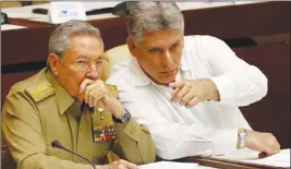  ?? AP PHOTO ?? In this July 6, 2013 file photo, Cuba’s President Raul Castro, left, and Vice President Miguel DiazCanel Bermudez attend the opening of a two-day, twice-annual legislativ­e sessions, at the National Assembly in Havana, Cuba.