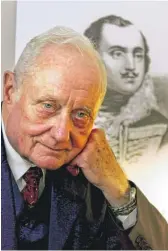  ?? STEPHEN MORTON/AP ?? Dr. James C. Metts Jr. poses in front of a portrait of Brig. Gen. Casimir Pulaski in Savannah, Georgia, in 2005.