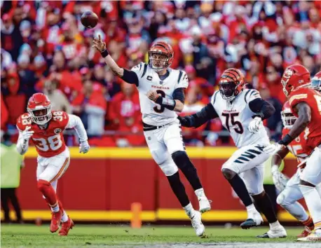 ?? Jamie Squire/Getty Images 2022 ?? Quarterbac­k Joe Burrow led a comeback in last season’s AFC Championsh­ip Game to send Cincinnati to the Super Bowl.