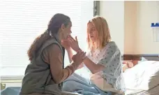  ?? JOJO WHILDEN, NETFLIX ?? Prairie Johnson (Brit Marling, right with Alic Krige) stars as a sightless woman who disappears for years on The OA.