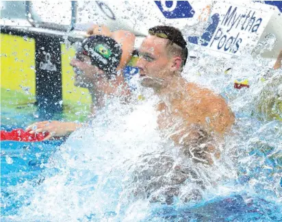  ?? Photo: AP ?? United States’ Caeleb Remel Dressel celebrates after winning the gold medal in the men’s 100-metre butterfly