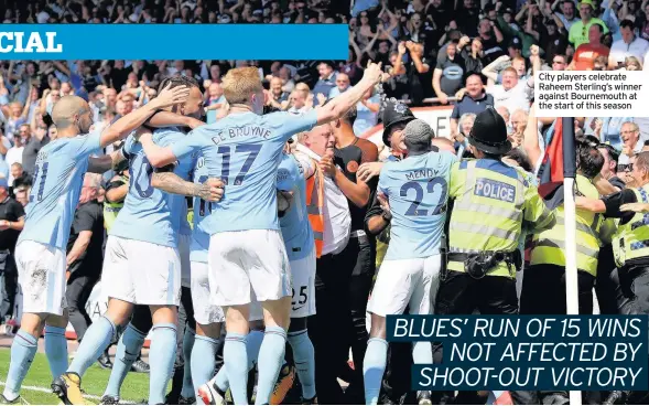  ??  ?? City players celebrate Raheem Sterling’s winner against Bournemout­h at the start of this season