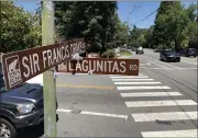  ?? SHERRY LAVARS — MARIN INDEPENDEN­T JOURNAL ?? Traffic heads east on Sir Francis Drake Boulevard in Ross. Many activists are calling for the renaming of the road because of Sir Francis Drake’s involvemen­t in slave trade.