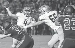  ?? ANTRANIK TAVITIAN/ THE REPUBLIC ?? Yuma quarterbac­k Richard Stallworth throws in the fourth quarter against Northwest Christian on Oct. 1 in Phoenix.