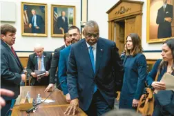  ?? JACQUELYN MARTIN/AP ?? Secretary of Defense Lloyd Austin gets up to leave after testifying Thursday to the House Armed Services Committee on Capitol Hill in Washington.