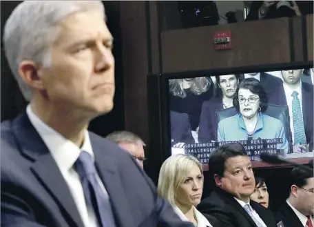  ?? Justin Sullivan Getty Images ?? SEN. DIANNE FEINSTEIN, on the monitor, brought up Roe vs. Wade at Neil M. Gorsuch’s Supreme Court confirmati­on hearing.