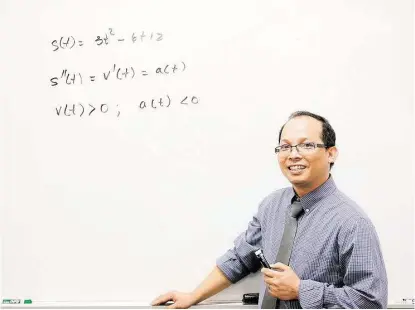  ?? Pin Lim / For the Chronicle ?? Clear Falls High School math teacher Anthony Tran’s focus on making students comfortabl­e and showing that he cares led to him earning recognitio­n as Region IV’s secondary teacher of the year.