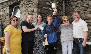  ??  ?? Elaine Uí Laighin, sponsor John Twomey, Karen Coakley (the Kenmare Foodie), Spud-Off Mór winner Josh Ó Braonáin, Máire Uí Mhoráin and John Sheehy.