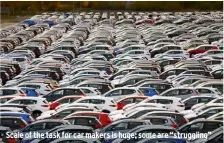  ??  ?? Scale of the task for car makers is huge; some are “struggling”