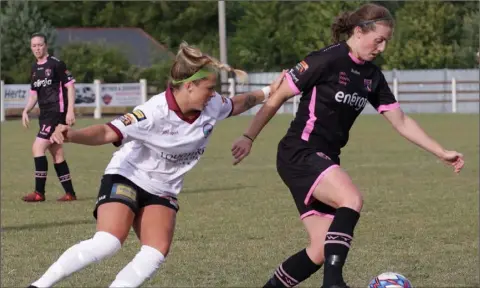  ??  ?? Edel Kennedy of Wexford Youths shielding the ball from Galway’s Emma Starr.