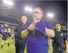  ?? LM OTERO/ASSOCIATED PRESS ?? TCU coach Gary Patterson walks off the field after his team’s Oct. 1 game against Oklahoma State. Whether or not he’d actually want to take over the Texas program, Patterson would like to be courted.