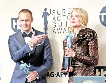  ??  ?? Skarsgard and Kidman pose with their awards at the 24th Screen Actors Guild Awards recently. — Reuters file photo