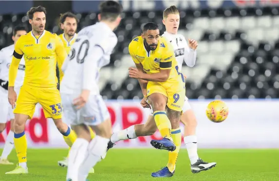  ?? Picture: Alex James/JMP ?? Bristol Rovers’ Stefan Payne shoots at goal during last night’s Checkatrad­e Trophy match against Swansea City U21s. Report: Page 39