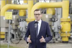  ?? AP photo ?? Poland’s Prime Minister Mateusz Morawiecki speaks to media at the gas station of Gaz-System in Rembelszcz­yzna, near Warsaw, Poland on Wednesday. Polish and Bulgarian leaders accused Moscow of using natural gas to blackmail their countries after Russia’s state-controlled energy company stopped supplying the two European nations Wednesday.