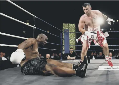  ??  ?? Lee Mcallister stands over Danny Williams after knocking him to the canvas on his way to victory at Aberdeen’s Beach Ballroom.