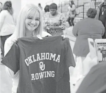  ?? [PHOTO BY CHRIS LANDSBERGE­R, THE OKLAHOMAN] ?? Norman North’s Cassidy Mulligan poses for a photo after signing her letter of intent to row for the University of Oklahoma last week.