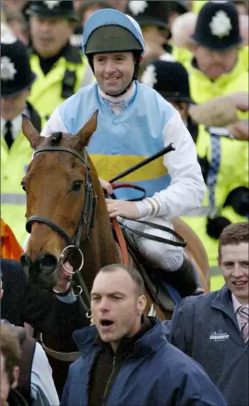  ??  ?? A delighted Conor O’Dwyer on board Hardy Eustace after winning the Champion Hurdle in 2005.