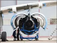  ?? (Bloomberg/Nathan Laine) ?? A turbofan engine manufactur­ed by Rolls-Royce is shown.