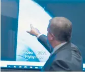  ?? ALEX BRANDON/AP ?? During testimony Tuesday on Capitol Hill, top Pentagon official Scott Bray points to an image of unidentifi­ed aerial phenomena captured on video.