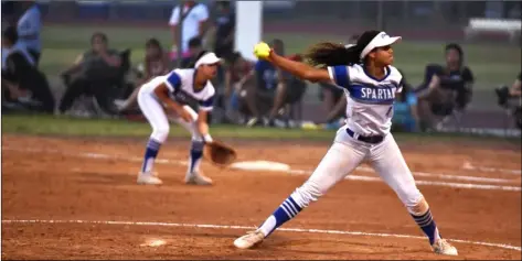  ?? PHOTO AARON BODUS ?? Central’s Janyssa Martin brings the heat during tuesday’s home playoff game against the Calipatria Hornets, which the Spartans won 5-2.