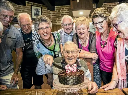  ?? BRADEN FASTIER/NELSON MAIL ?? Ex pupils of Hampden Street School celebrate their former teacher, Mr Harley Stokes’ 96th birthday at the Honest Lawyer pub in Nelson.