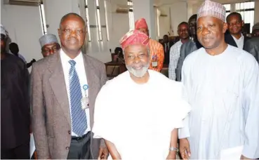  ??  ?? From left: Newly elected Vice-Chancellor, University of Ilorin, Professor Sulyman AbdulKaree­m Age, Chairman Governing Council, Dr. Abdullahi Jubril Oyekanmi and outgoing VC, Professor Abdulganiy­u Ambali.