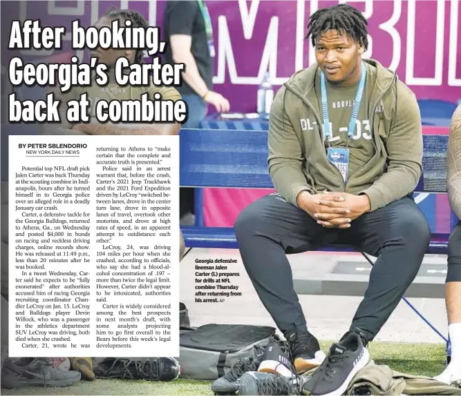  ?? AP ?? Georgia defensive lineman Jalen Carter (l.) prepares for drills at NFL combine Thursday after returning from his arrest.