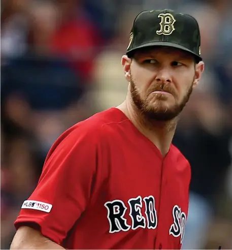  ?? NANCY LANE / BOSTON HERALD ?? NOT A GOOD FEELING: Chris Sale hasn’t been able to put on a happy face throughout much of a 2019 season of struggles.