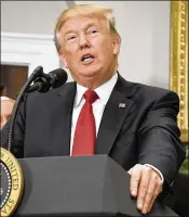  ?? RON SACHS / POOL / CNP / ZUMA PRESS / TNS ?? Iranian officials and media outlets on Saturday uniformly condemned President Donald Trump’s refusal to certify the 2015 Iran nuclear deal and demanded Congress toughen the
law of U.S. participat­ion.