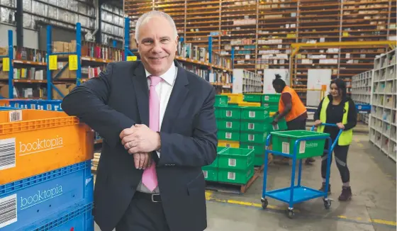  ??  ?? Booktopia CEO Tony Nash says the company is keeping its shelves well-stocked with overseas orders. Picture: Britta Campion/the Australian