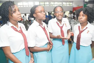  ?? RUDOLPH BROWN/PHOTOGRAPH­ER ?? From left: Wolmer’s girls Lorrea Wright, Kristina Ambersley, Kandice Ambersley, and Gabrielle Lowe at the National Child Month Committee Annual Child Month Youth Forum themed ‘Take Action. Break the Chain of Abuse against Children’ at The St Andrew...