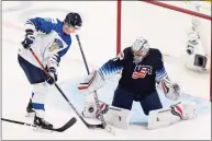  ?? Codie McLachlan / Getty Images ?? United States goaltender Spencer Knight stops Finland’s Henri Nikkanen during the IIHF World Junior Championsh­ip semifinals at Rogers Place in Edmonton, Canada, on Monday.