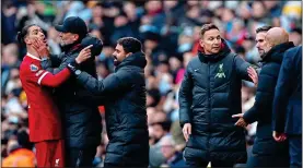  ?? ?? COOL IT: Nunez is held at bay by his boss Klopp after a spat with Guardiola