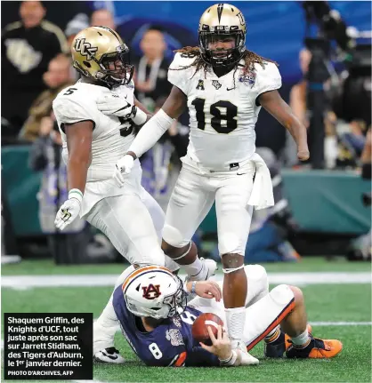  ?? PHOTO D’ARCHIVES, AFP ?? Shaquem Griffin, des Knights D’UCF, tout juste après son sac sur Jarrett Stidham, des Tigers d’auburn, le 1er janvier dernier.