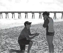  ?? COURTESY OF THE TOWNSEND FAMILY ?? Derek Townsend proposed to Kelsey on the beach in Panama City, Florida.